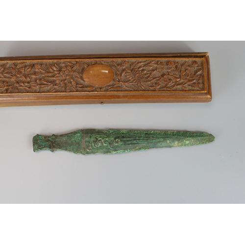 208 - An Archaic Bronze Spearhead, Shang/ early Western Zhou dynasty,  the slender blade finely decorated ... 