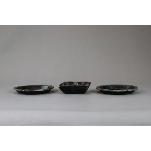 217 - A Set of Three Black Lacquer dishes, Song/Yuan dynasty two dishes in rounded sides with overall blac... 