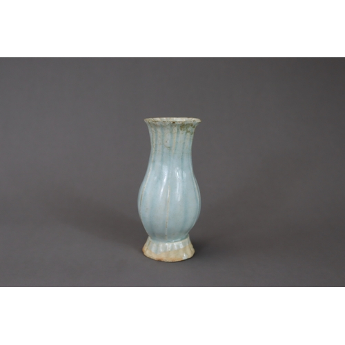 220 - A Moulded Qingbai Lobed Vase, Song dynasty moulded in two pieces from the white ware, the rounded si... 