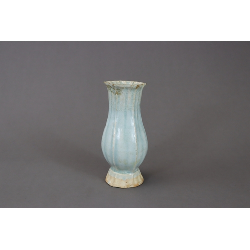 220 - A Moulded Qingbai Lobed Vase, Song dynasty moulded in two pieces from the white ware, the rounded si... 