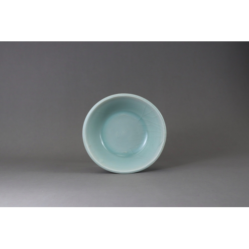 224 - A Longquan Celadon Brushwash, Song dynasty with straight flared sides rising at an angle from a tape... 