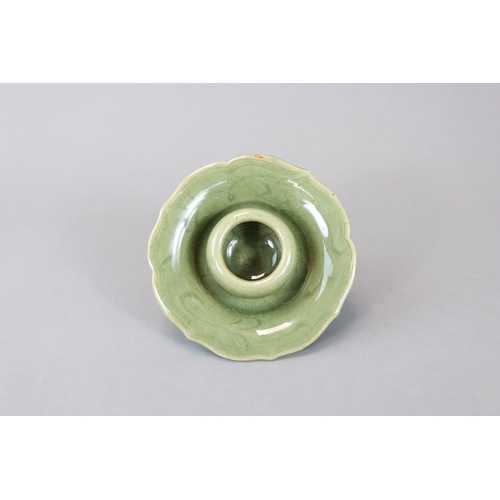 226 - A Longquan Celadon Cupstand, Yuan dynasty heavily potted, the raised cup holder with curved sides ab... 