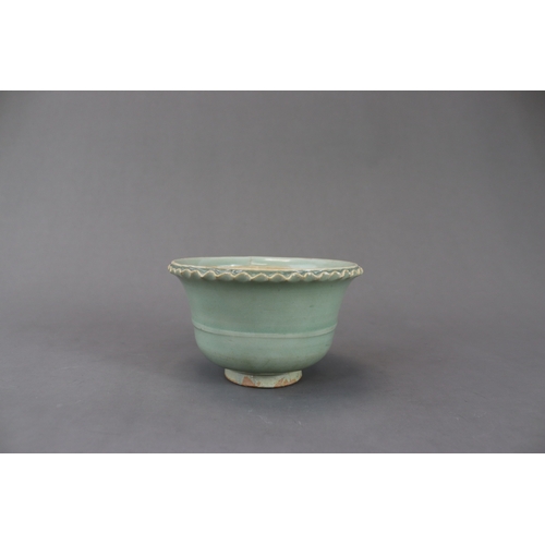 228 - A Longquan Celadon Jardiniere, Yuan dynasty the short, splayed foot supporting the  rounded bowl, wi... 