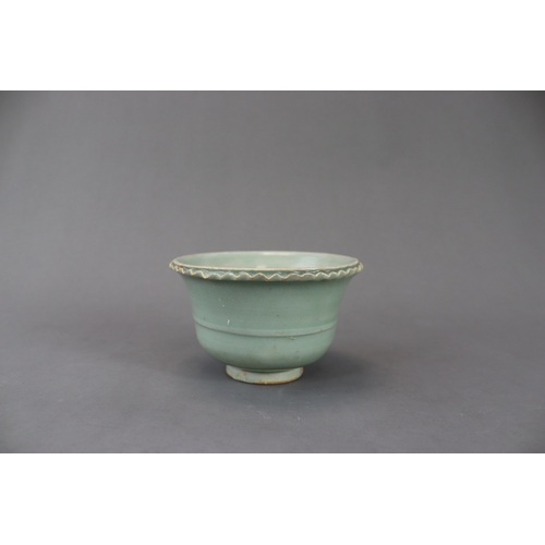 228 - A Longquan Celadon Jardiniere, Yuan dynasty the short, splayed foot supporting the  rounded bowl, wi... 