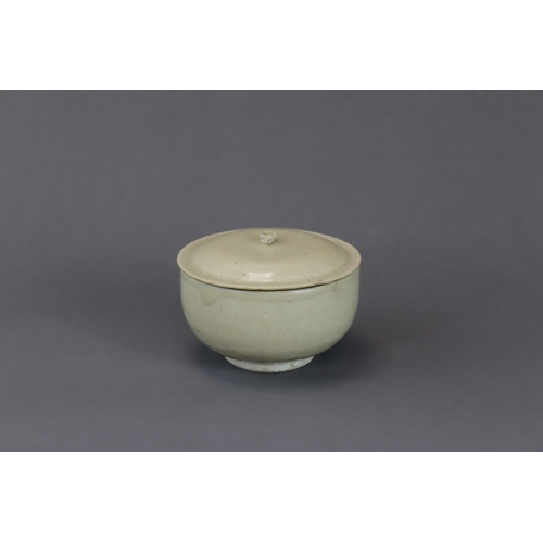 229 - A Ding-type White-glazed Bowl and Cover, Song dynasty the deep, slightly incurved walls supported on... 