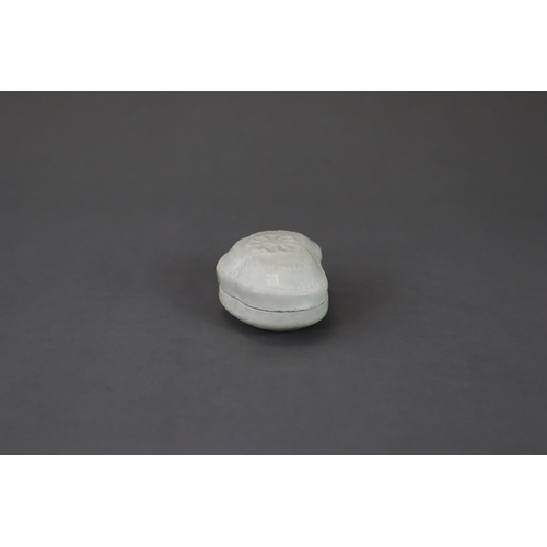 45 - A Rare White-glazed 'trefoil-form' Box and Cover, Five Dynasties, moulded in trefoil shape, a flower... 