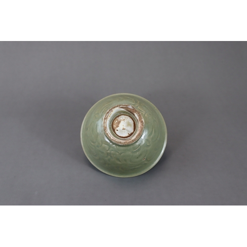 234 - A Yaozhou Celadon Carved 'Peony' Bowl, Song dynasty with deep rounded sides rising from a straight f... 