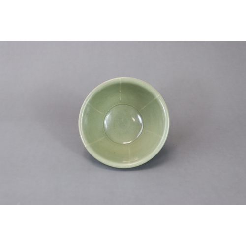 234 - A Yaozhou Celadon Carved 'Peony' Bowl, Song dynasty with deep rounded sides rising from a straight f... 