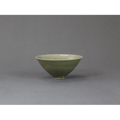 235 - A Yaozhou Celadon Conical Cup, Song dynasty of conical shape, thinly potted from the short straight ... 