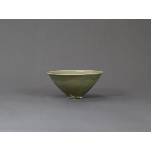 235 - A Yaozhou Celadon Conical Cup, Song dynasty of conical shape, thinly potted from the short straight ... 