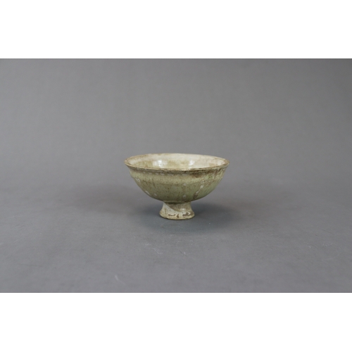 25 - A Celadon-glazed Stemcup, Sui or Yuan dynasty formerly in the Eumorfopoulos collection, of rounded s... 