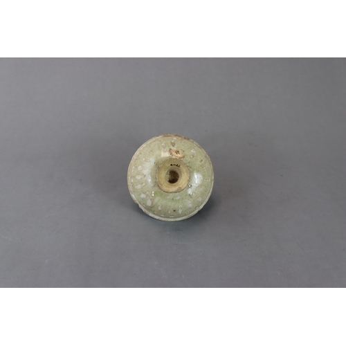 25 - A Celadon-glazed Stemcup, Sui or Yuan dynasty formerly in the Eumorfopoulos collection, of rounded s... 