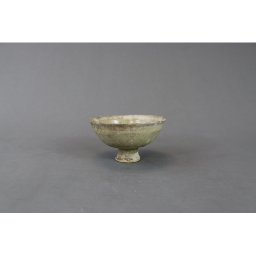 25 - A Celadon-glazed Stemcup, Sui or Yuan dynasty formerly in the Eumorfopoulos collection, of rounded s... 