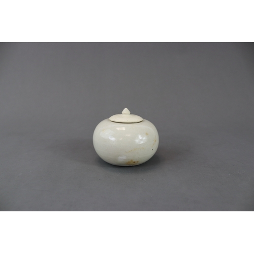 27 - A White-glazed Globular Waterpot and Cover, Sui dynasty with rounded sides, both waterpot and cover ... 