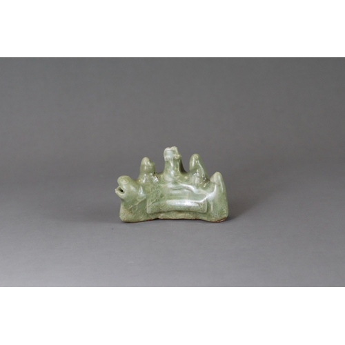 3 - A Longquan Celadon Brushrest-shape Waterdropper, Ming dynasty the crescent-form water dropper modell... 