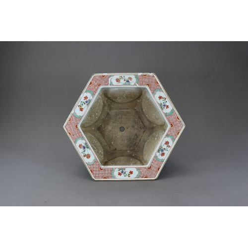 313 - A 'famille verte' Hexagonal Jardiniere, Kangxi, the rounded sides flaring from the waisted pierced f... 