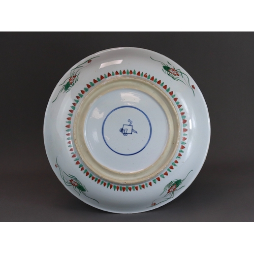 314 - A 'famille verte' Kylin and Phoenix Dish, Kangxi, brightly enamelled with an overall scene of the au... 