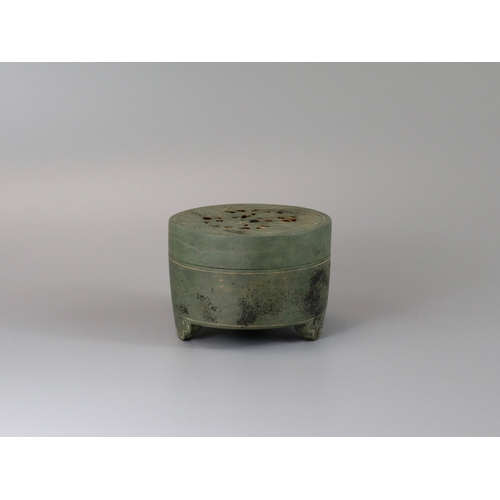 32 - A Rare Stone Cylindrical Tripod Incense Burner and Cover, Song dynasty the cover pierced with a scro... 