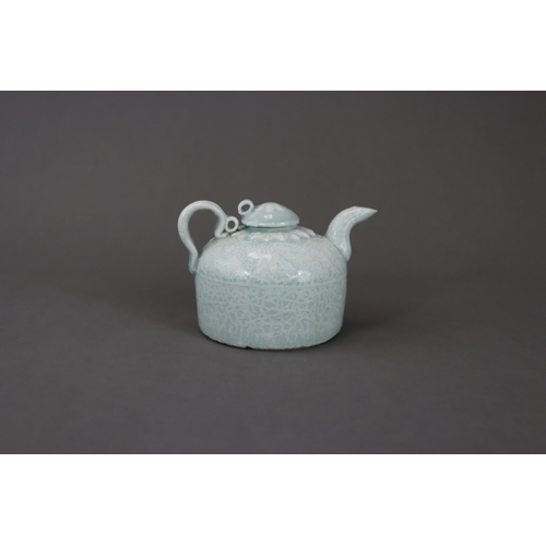 33 - A Qingbai Ewer and Cover, Song dynasty the beehive-shaped body rising from a flat unglazed base, mou... 