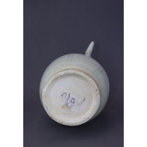 222 - A Qingbai Ewer, Song dynasty the ovoid body raised from the tapered foot to the tall waisted neck an... 