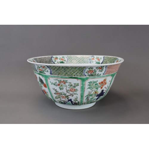 133 - A ‘famille verte’ Punchbowl, Kangxi,	with rounded sides flaring slightly to the rim and decorated on... 