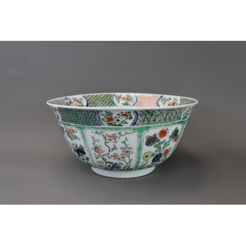 133 - A ‘famille verte’ Punchbowl, Kangxi,	with rounded sides flaring slightly to the rim and decorated on... 