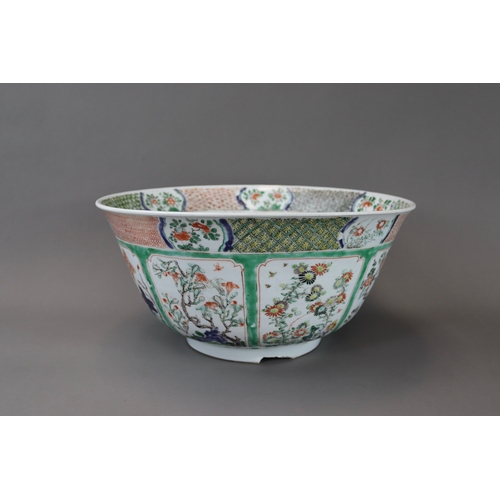 133 - A ‘famille verte’ Punchbowl, Kangxi,	with rounded sides flaring slightly to the rim and decorated on... 