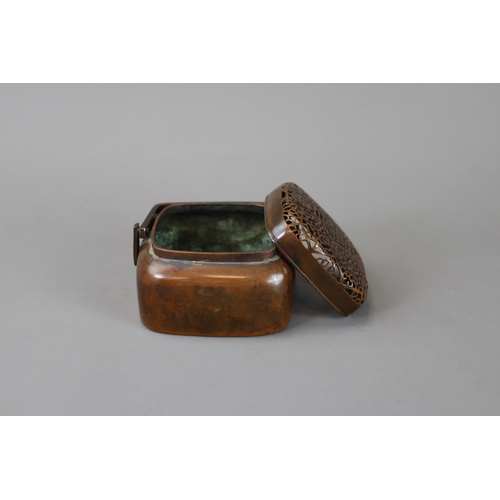 158 - A Copper Alloy Hand Warmer and Cover, 17th century,	with rich dark patina, of  entirely undecorated ... 