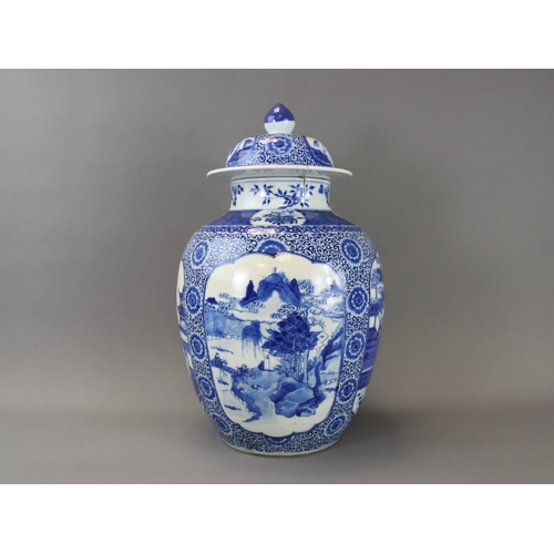 157 - An Attractive Pair of Blue and White Jars and Covers with Figures, 19th century, of ovoid form, deco... 