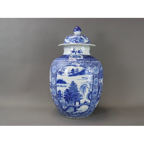 157 - An Attractive Pair of Blue and White Jars and Covers with Figures, 19th century, of ovoid form, deco... 