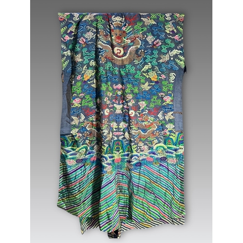 139 - A Silk Kesi Dragon Robe, 19th Century brightly worked with five - clawed dragons in gilt and colours... 