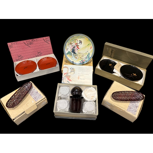 161 - Qty of boxed Chinese items, plates, wicker items etc