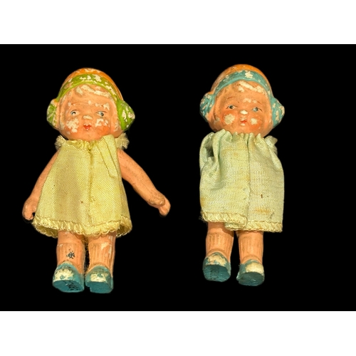 57 - 2 small pottery doll figures, one missing arms