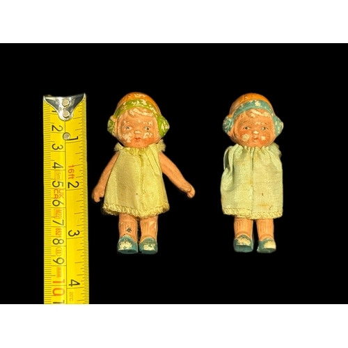 57 - 2 small pottery doll figures, one missing arms