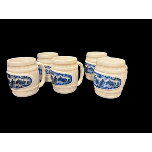 141 - 5 Dutch milk glass tankards