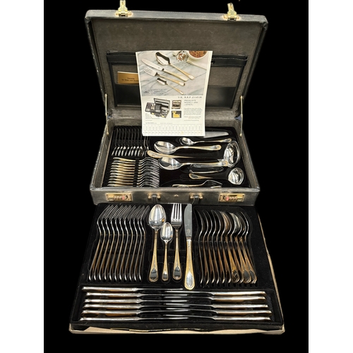 29 - Large boxed silver plated 12 place setting cutlery set
