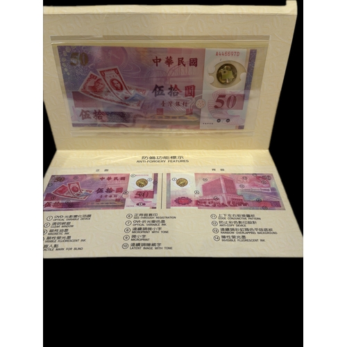 36 - 50th anniversary new Taiwan note and boxed coin