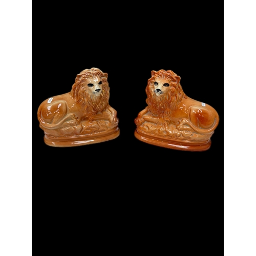 122 - Pair of Victorian Staffordshire lions H25cm