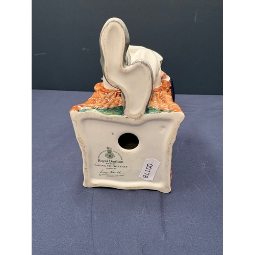 131 - Royal Doulton figurine ‘Taking Things Easy’
 