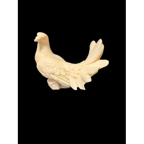 130 - Alabaster carved dove 14.5cm H