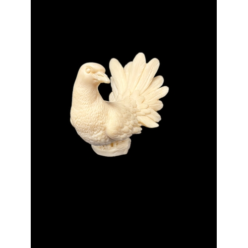 130 - Alabaster carved dove 14.5cm H