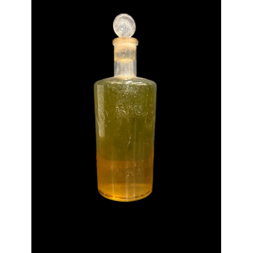 157 - French glass bottle and contents believed to be Mens Eau d Parfume unable to removed glass stopper h... 