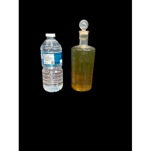157 - French glass bottle and contents believed to be Mens Eau d Parfume unable to removed glass stopper h... 
