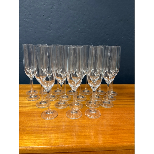 162 - 21 Dartington &ldquo;six&rdquo; flute glasses 24.5cm H