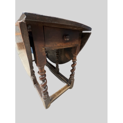 492 - Antique oak gateleg table on barley twist supports
(open 151cm x 131 x 72H) closed 131cm x 50cm ... 