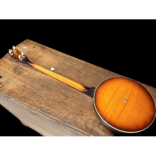 182 - Cripple creek resonator Banjo and case