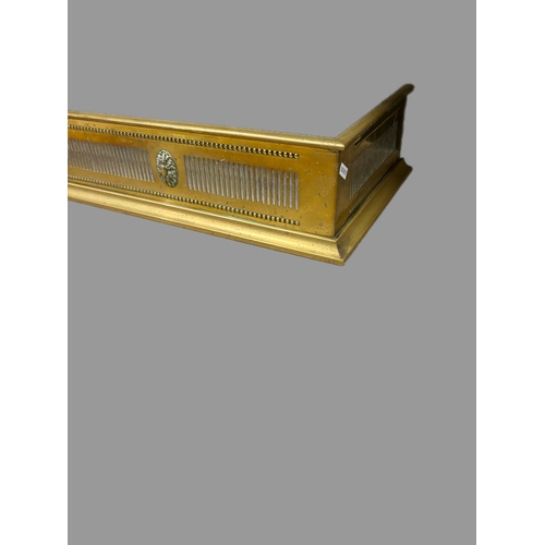 499 - Antique brass fire fender 118cm W x 30cm D x 13cm H Carved wooden fender 103cm x 33cm x 8.5cm... 