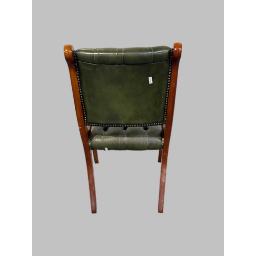 516 - Green leather buttoned chair