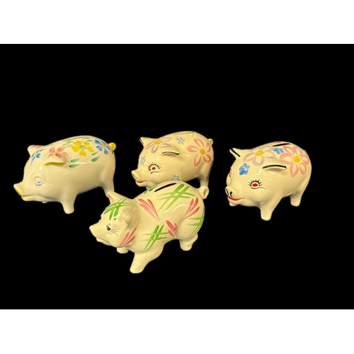 139 - 4 vintage ceramic pig money boxes
