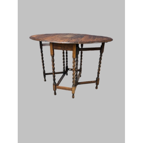 518 - Antique oak barley twist gateleg table37cm x 76cm closed 105cm x 76cm open72cm H ... 